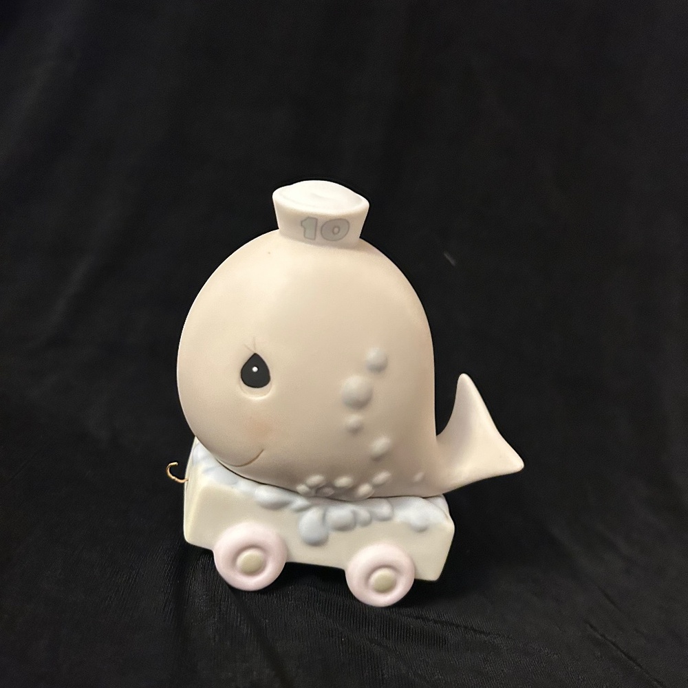 Presious Moments 10-year birthday train figurine.